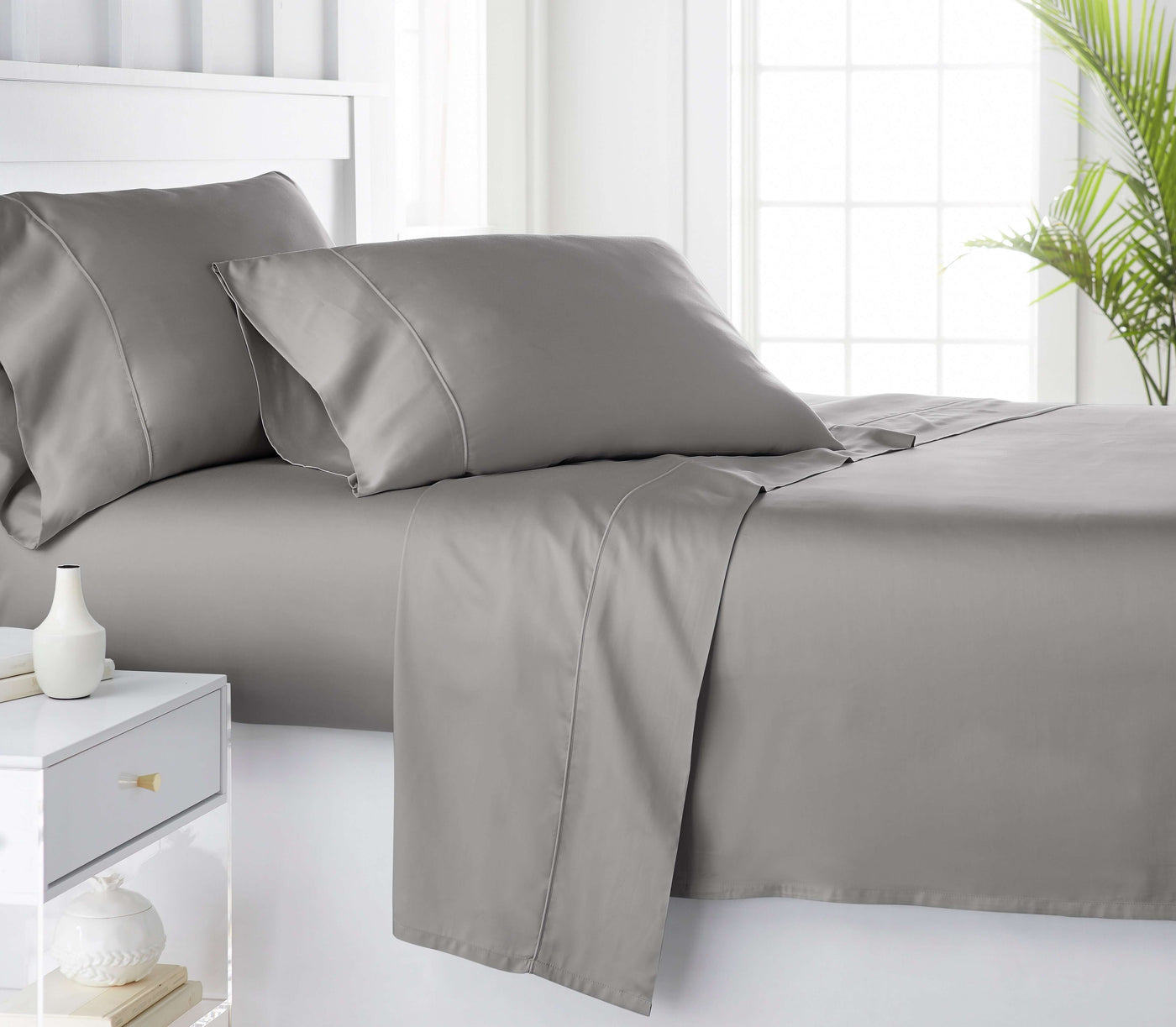 Grey organic bamboo bed sheets on the bed